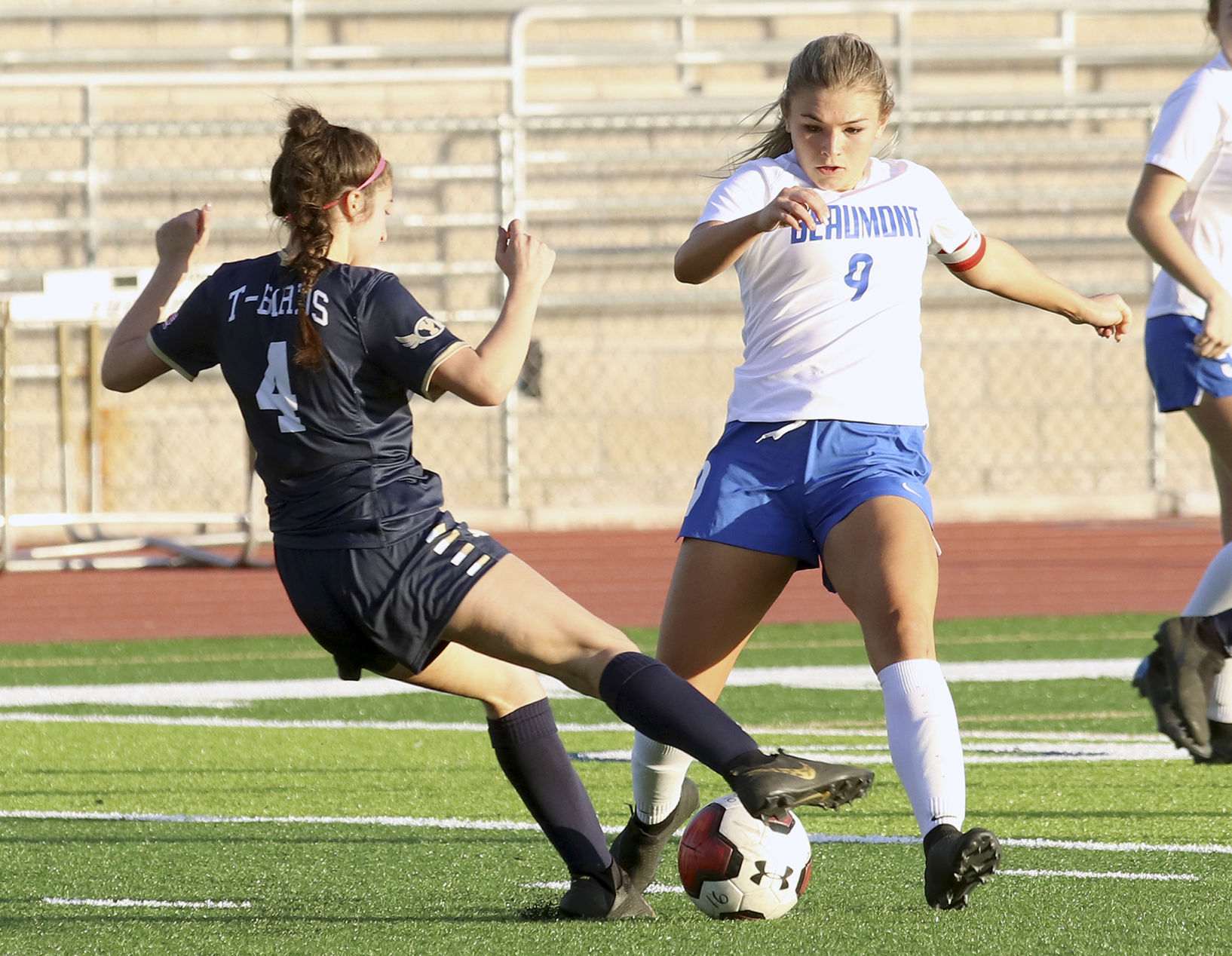 Beaumont's Jones, number 9, evades Marissa Cole of Yucaipa